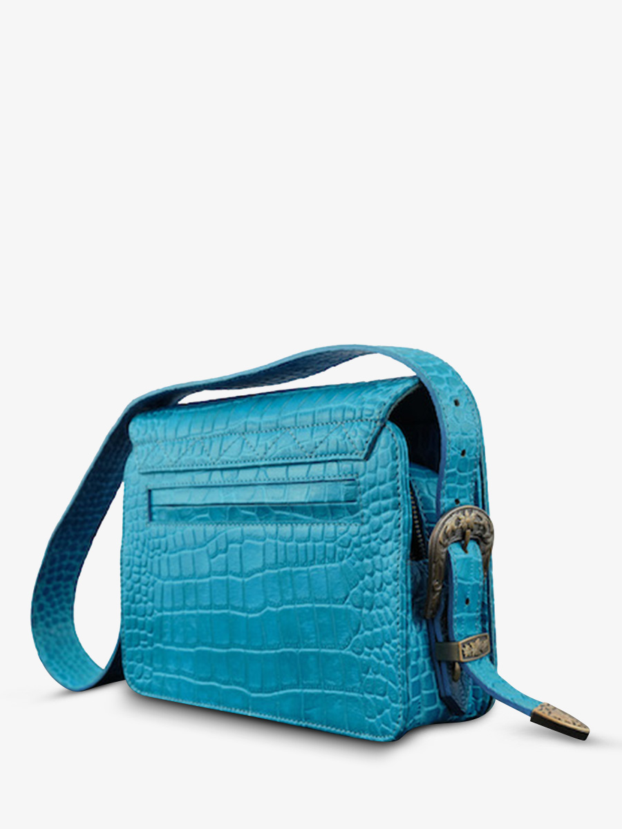 foto-buideltas-leder-vrouw-blauw-leg-alligator-cocktail-topaas-paul-marius-w29-a-blu